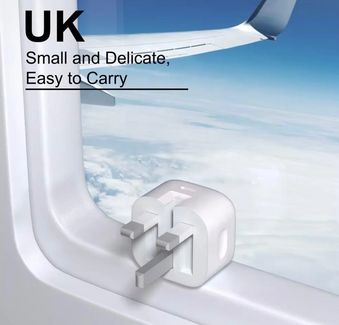 Compact MDKG UK plug charger on an aircraft window ledge